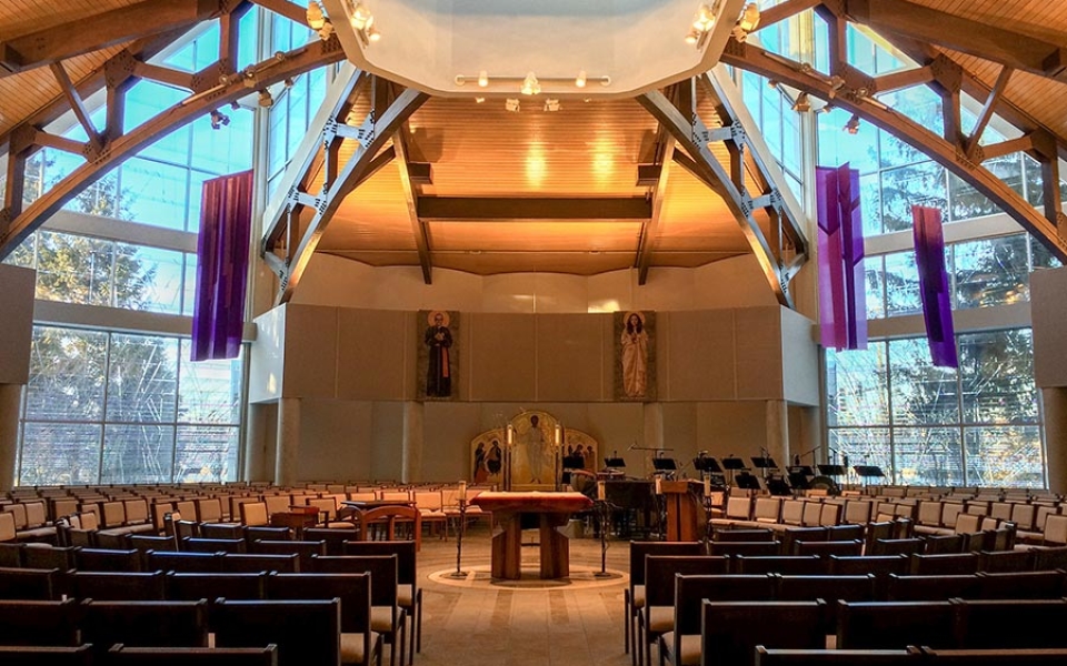 Within the circular space formed by 18 poured concrete pillars, worshipers feel included in the liturgy and embraced by divine love, which, as the 12th century mystic Hildegard of Bingen put it, encompasses "all that has life in one vast circle."