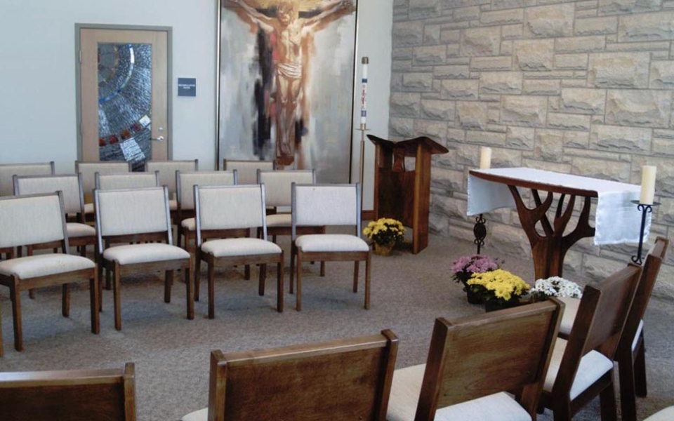 The Daily Chapel holds an eight foot high painting of the crucified Christ and the traditional Stations of the Cross, both of which are items from the Falvey Chapel, the chapel on campus that was used before the current building was constructed.