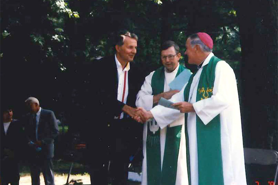 Father Dan Zak (left) with Father James Bacik and Bishop James Hoffman.