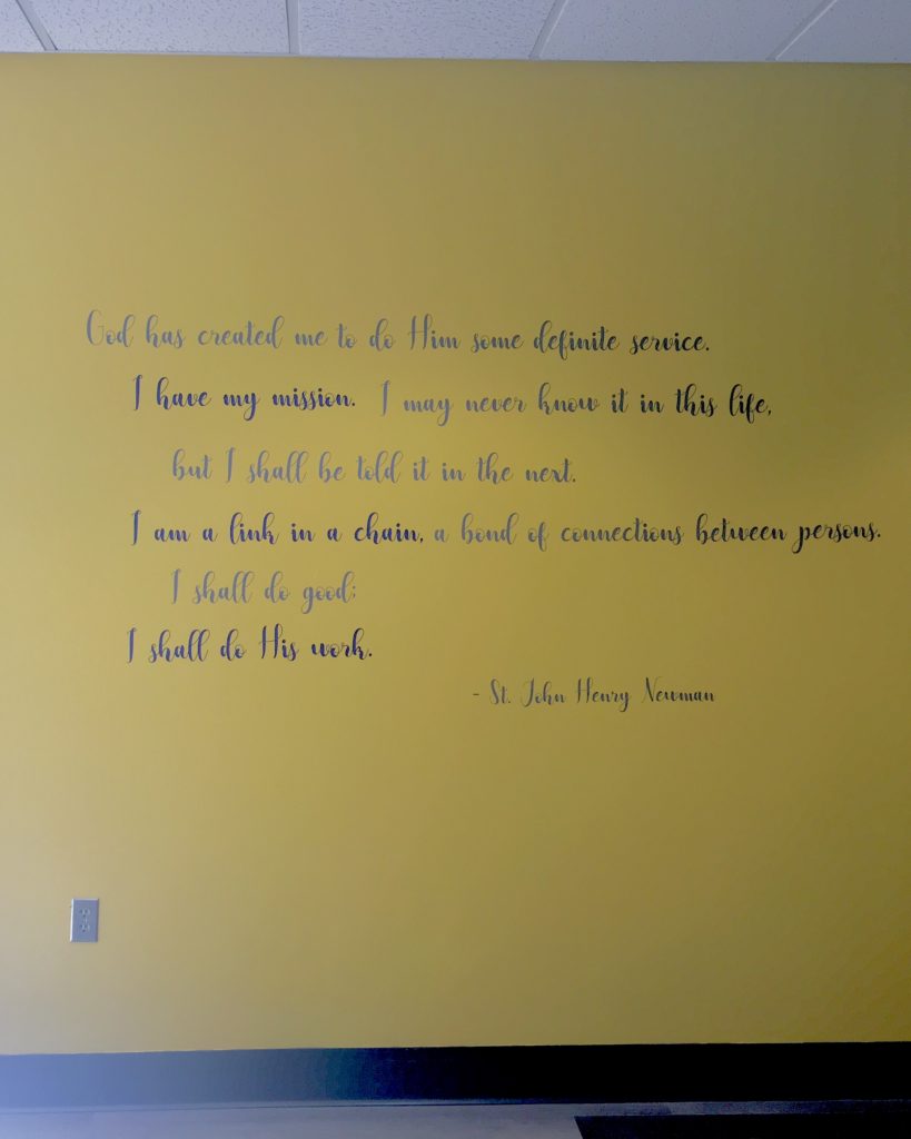 A quote from St. John Henry Newman handing in our Newman Rooms.